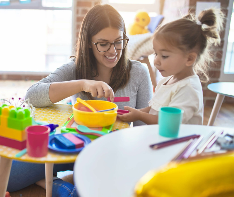 behavior technician and child during aba therapy session 